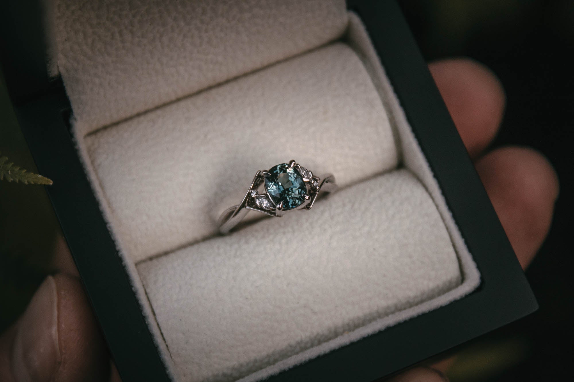 Teal sapphire and store diamond engagement ring