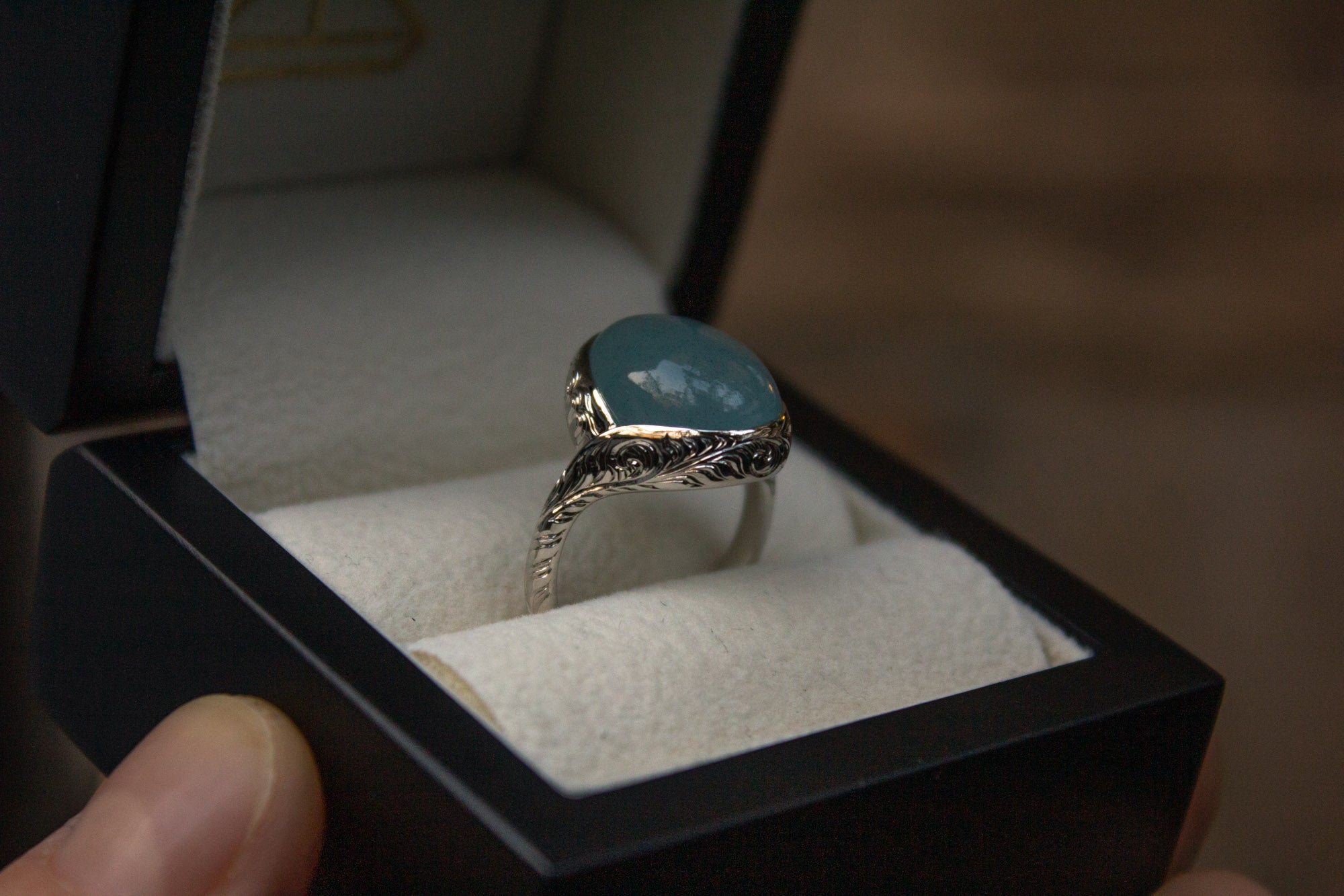 Bespoke cabochon aquamarine engraved platinum ring