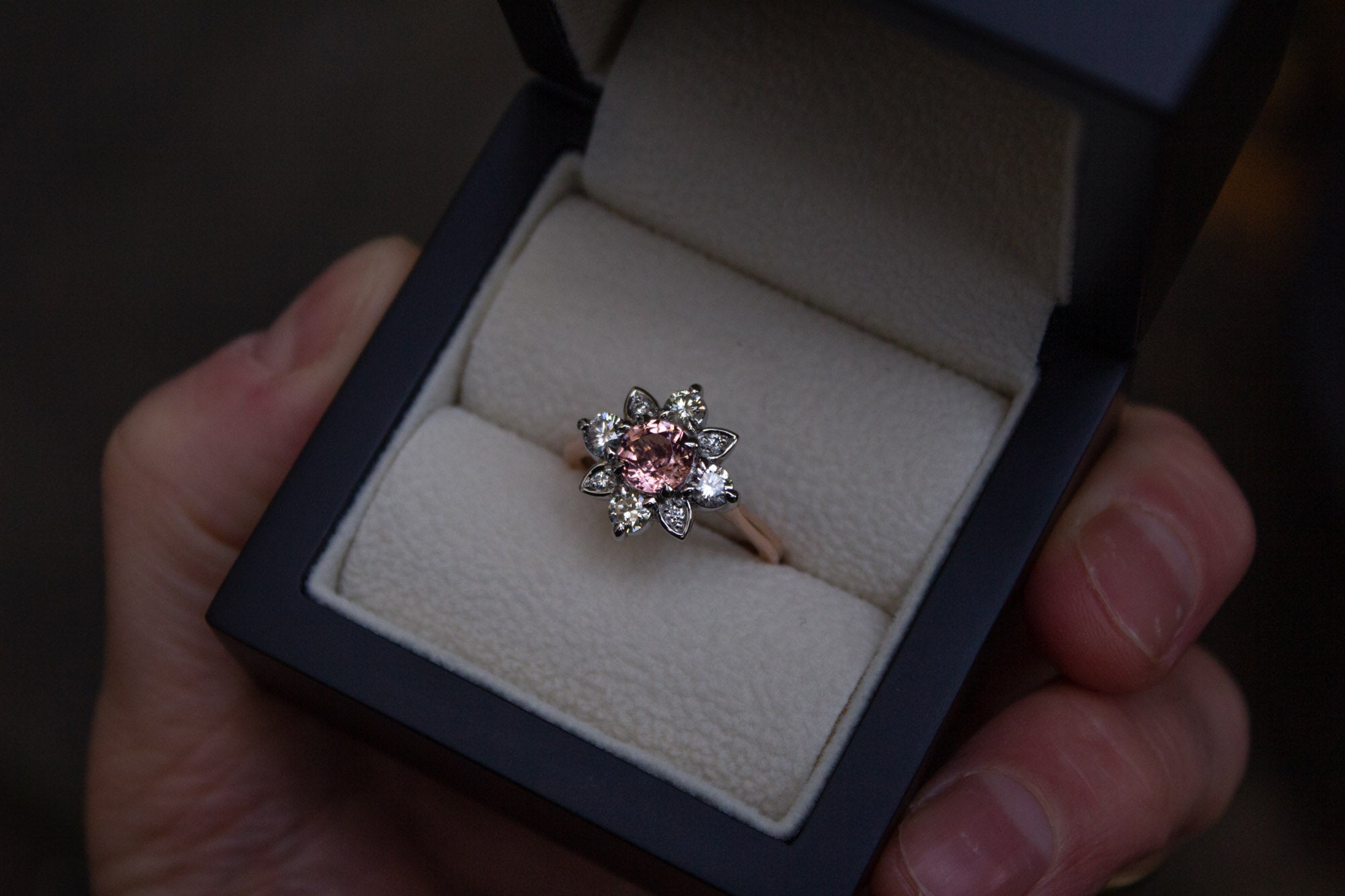Bespoke garnet and diamond engagement ring