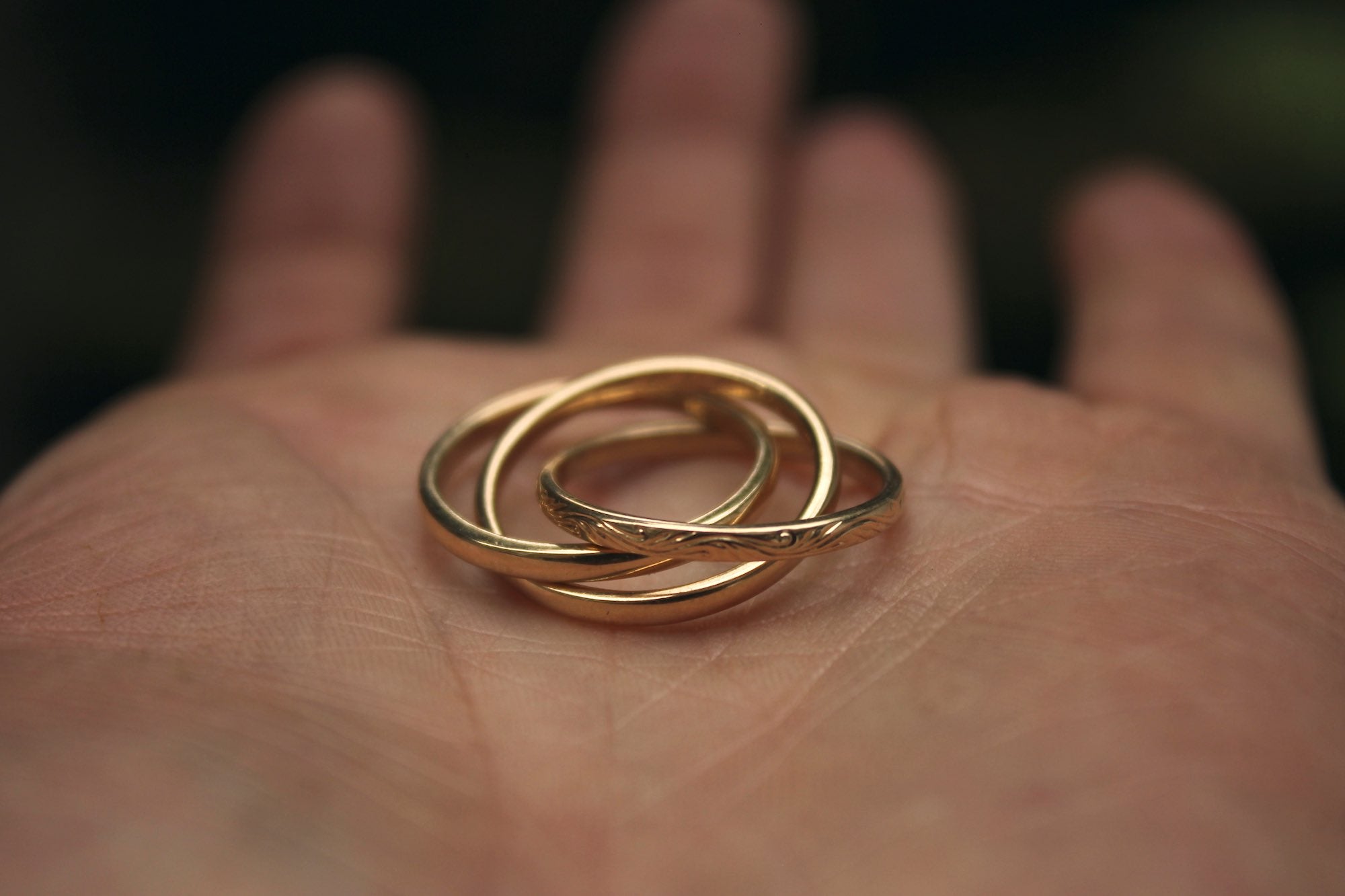 Intertwining Gold Rings