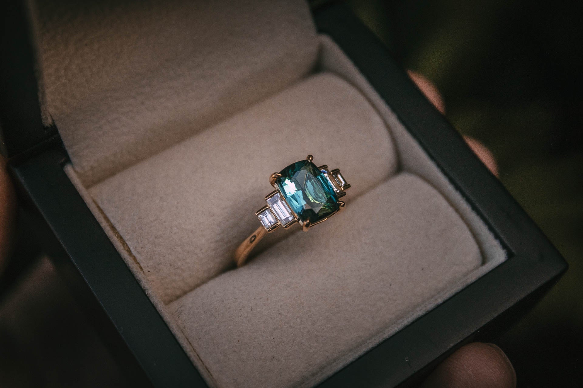 Bespoke indicolite tourmaline and diamond engagement ring