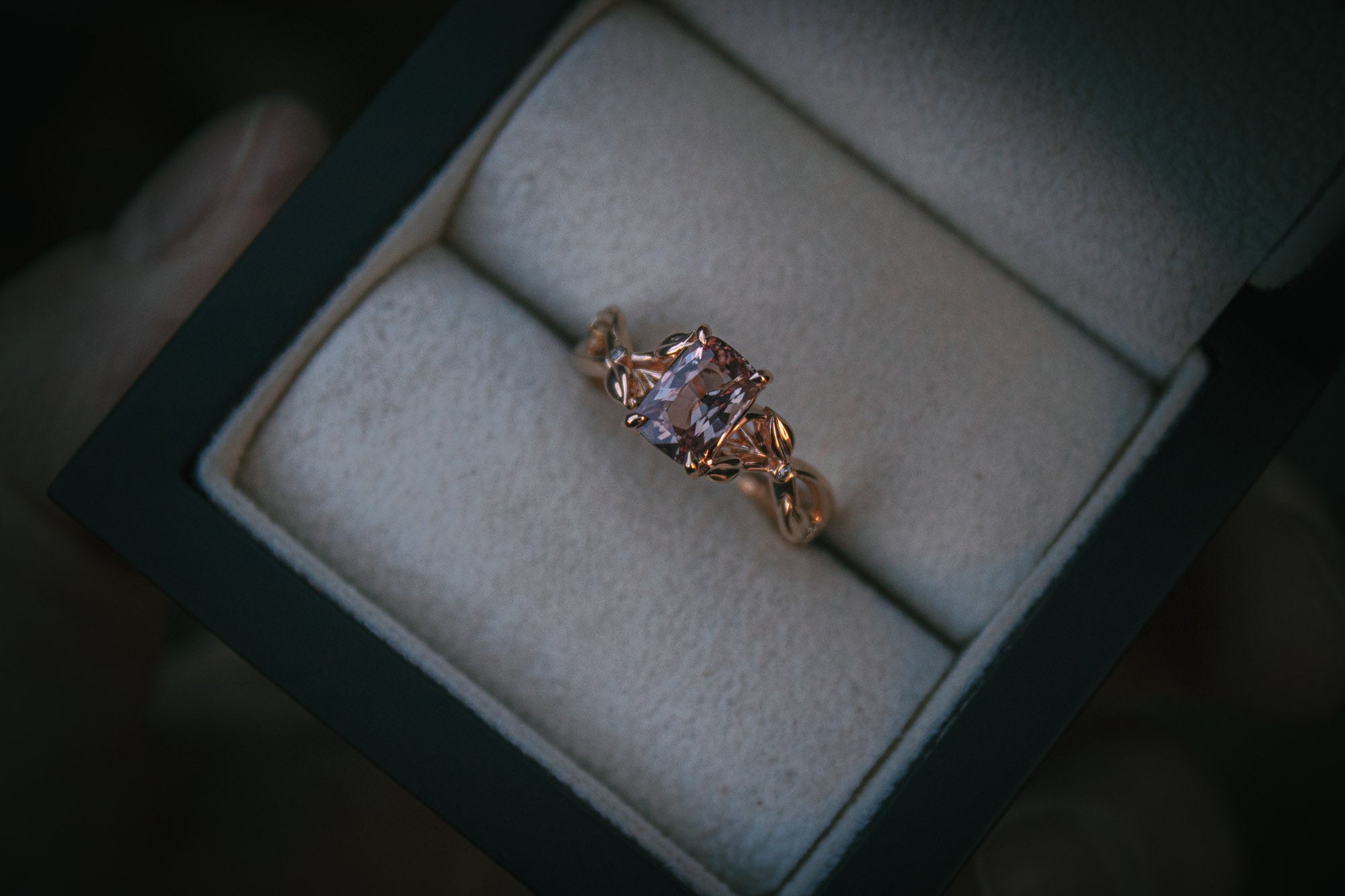 Bespoke Padparadscha sapphire and diamond engagement ring