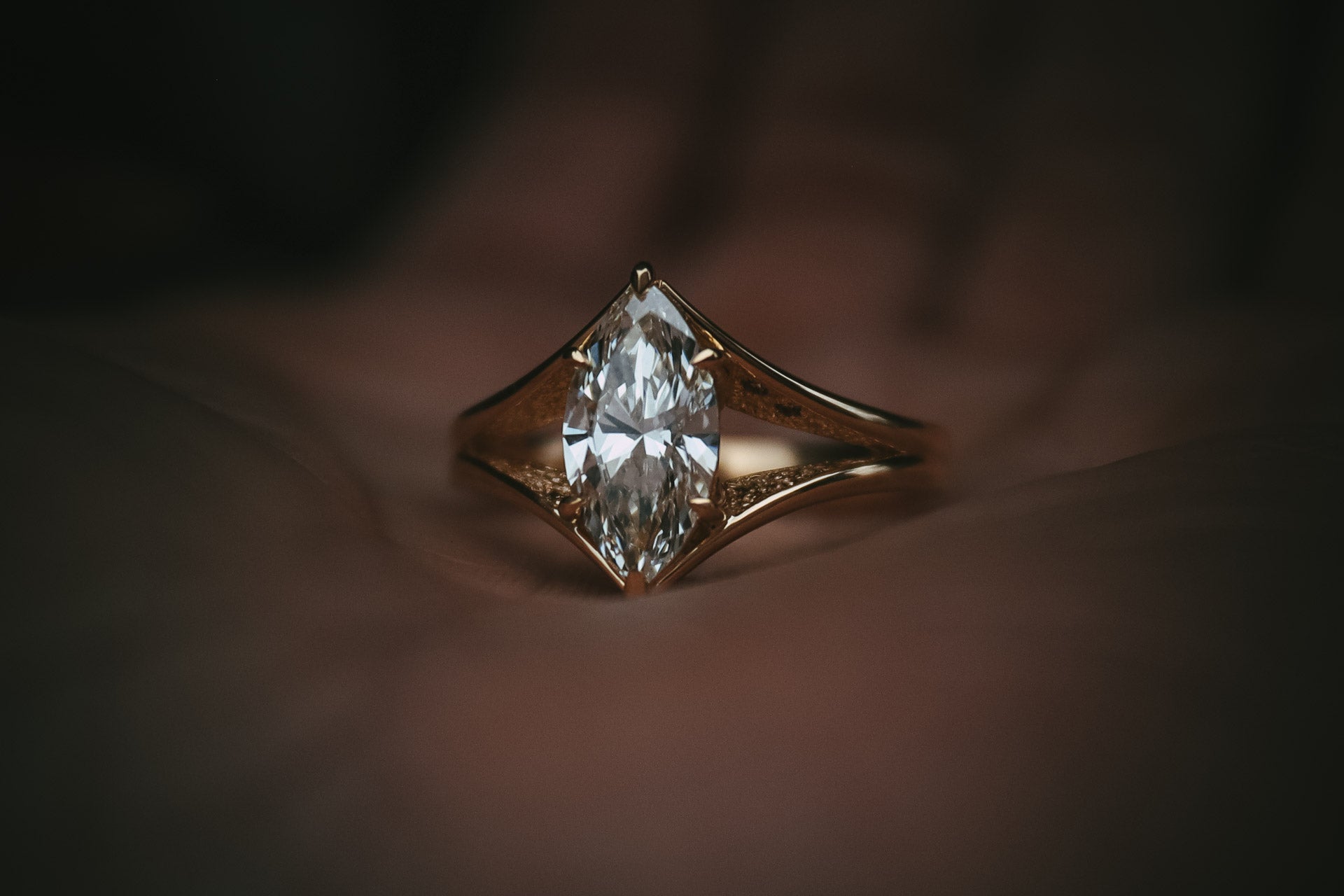 Bespoke Split Shank Marquise Diamond Engagement Ring in hand