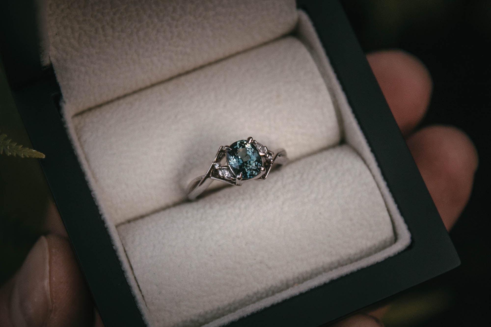 Bespoke teal sapphire and diamond engagement ring