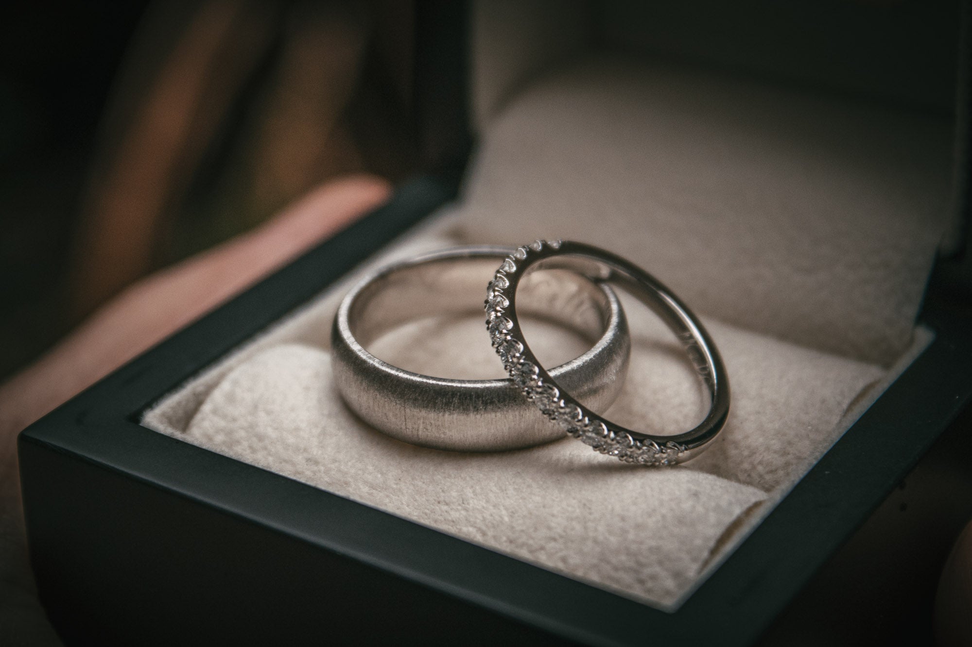 Bespoke textured and diamond platinum wedding rings