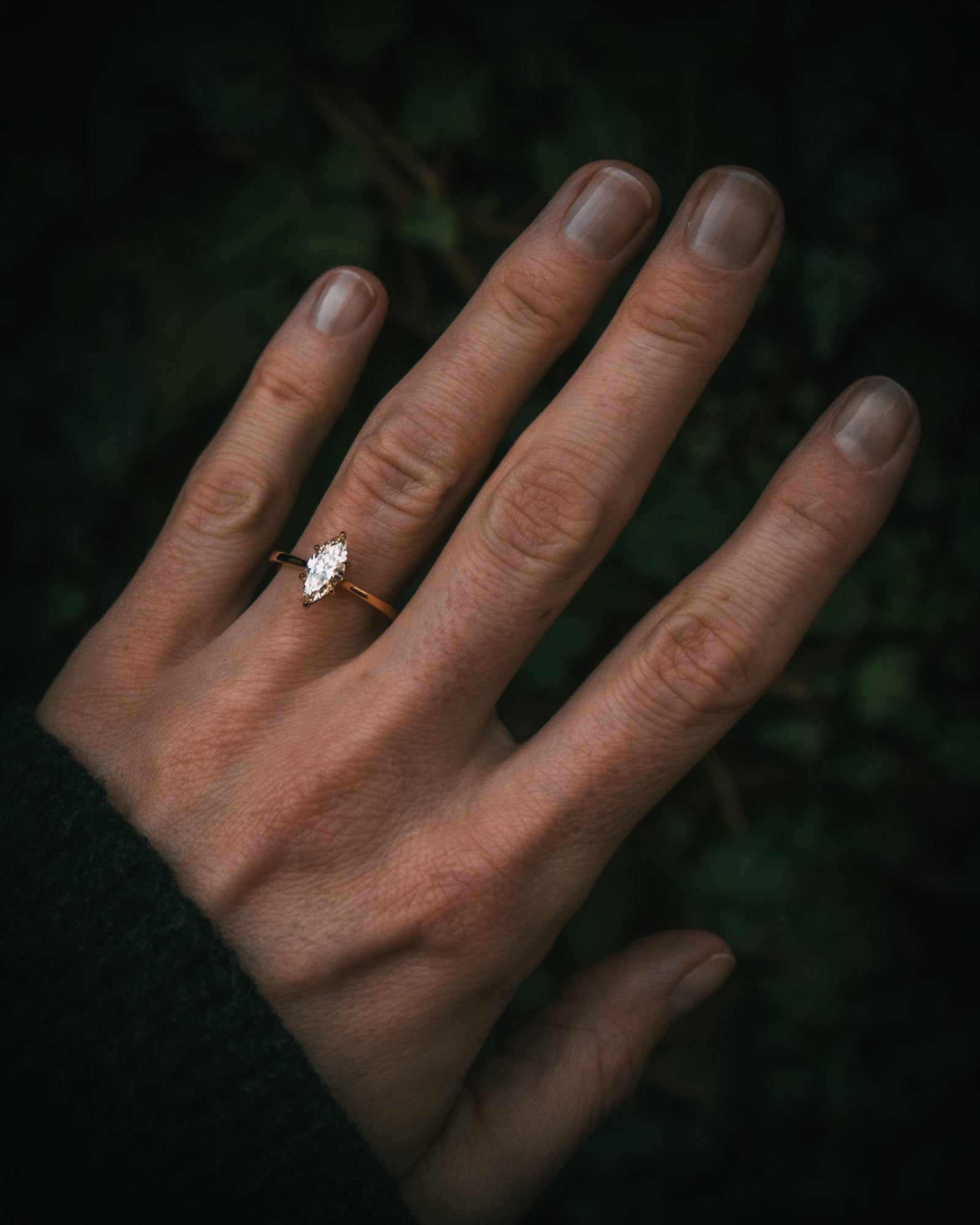 Uist natural marquise diamond solitaire ring on hand; warm white N colour diamond