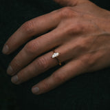 Uist natural marquise diamond solitaire ring on hand; Arc setting