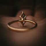 Uist marquise warm white natural diamond solitaire ring in 18ct yellow gold view from bottom Arc setting detail