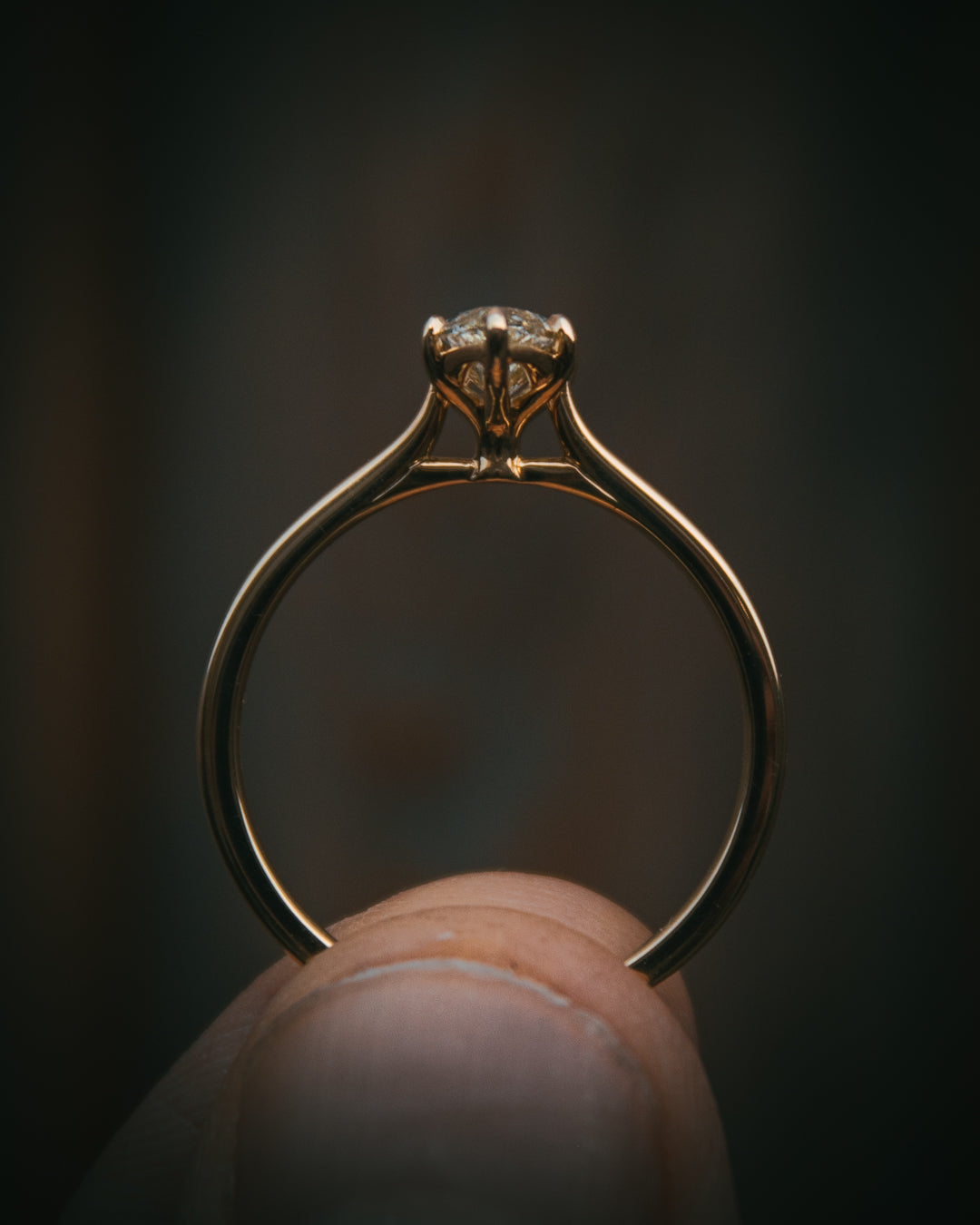 Uist marquise diamond ring; side profile showing wed-fit Arc shoulders