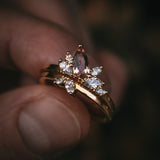 Fara ring set an asymmetric peach topaz engagement ring paired with a fitted diamond wedding ring by Moira Patience Fine Jewellery