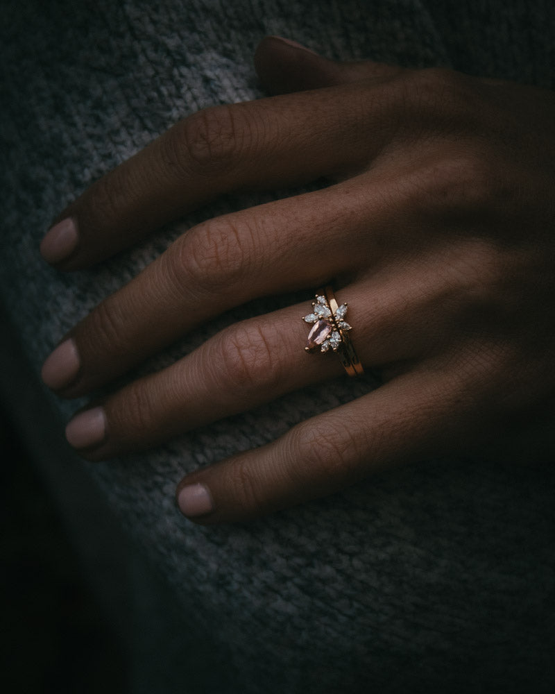 Fara ring set an asymmetric peach topaz engagement ring paired with a fitted diamond wedding ring by Moira Patience Fine Jewellery
