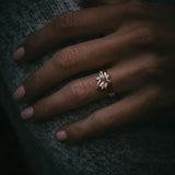 Fara ring set an asymmetric peach topaz engagement ring paired with a fitted diamond wedding ring by Moira Patience Fine Jewellery