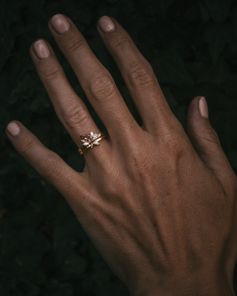 Fara ring set an asymmetric peach topaz engagement ring paired with a fitted diamond wedding ring by Moira Patience Fine Jewellery