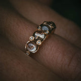 Fótla ring in 18ct yellow gold with four natural champagne diamond cabochons and white diamond accents