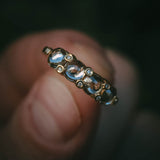 Fótla ring in 18ct yellow gold with four natural champagne diamond cabochons and white diamond accents