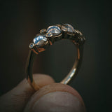 Fótla ring in 18ct yellow gold with four natural champagne diamond cabochons and white diamond accents