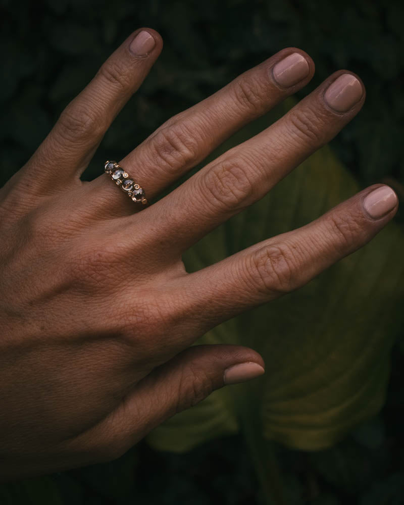 Fótla ring in 18ct yellow gold with four natural champagne diamond cabochons and white diamond accents