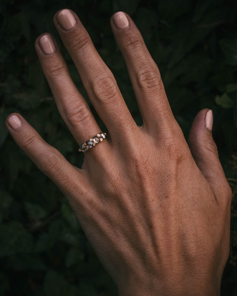 Fótla ring in 18ct yellow gold with four natural champagne diamond cabochons and white diamond accents