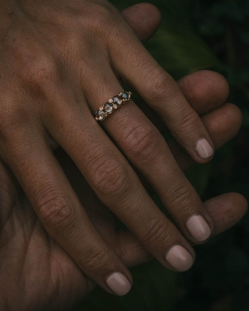 Fótla ring in 18ct yellow gold with four natural champagne diamond cabochons and white diamond accents