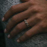 Fótla ring in 18ct yellow gold with four natural champagne diamond cabochons and white diamond accents