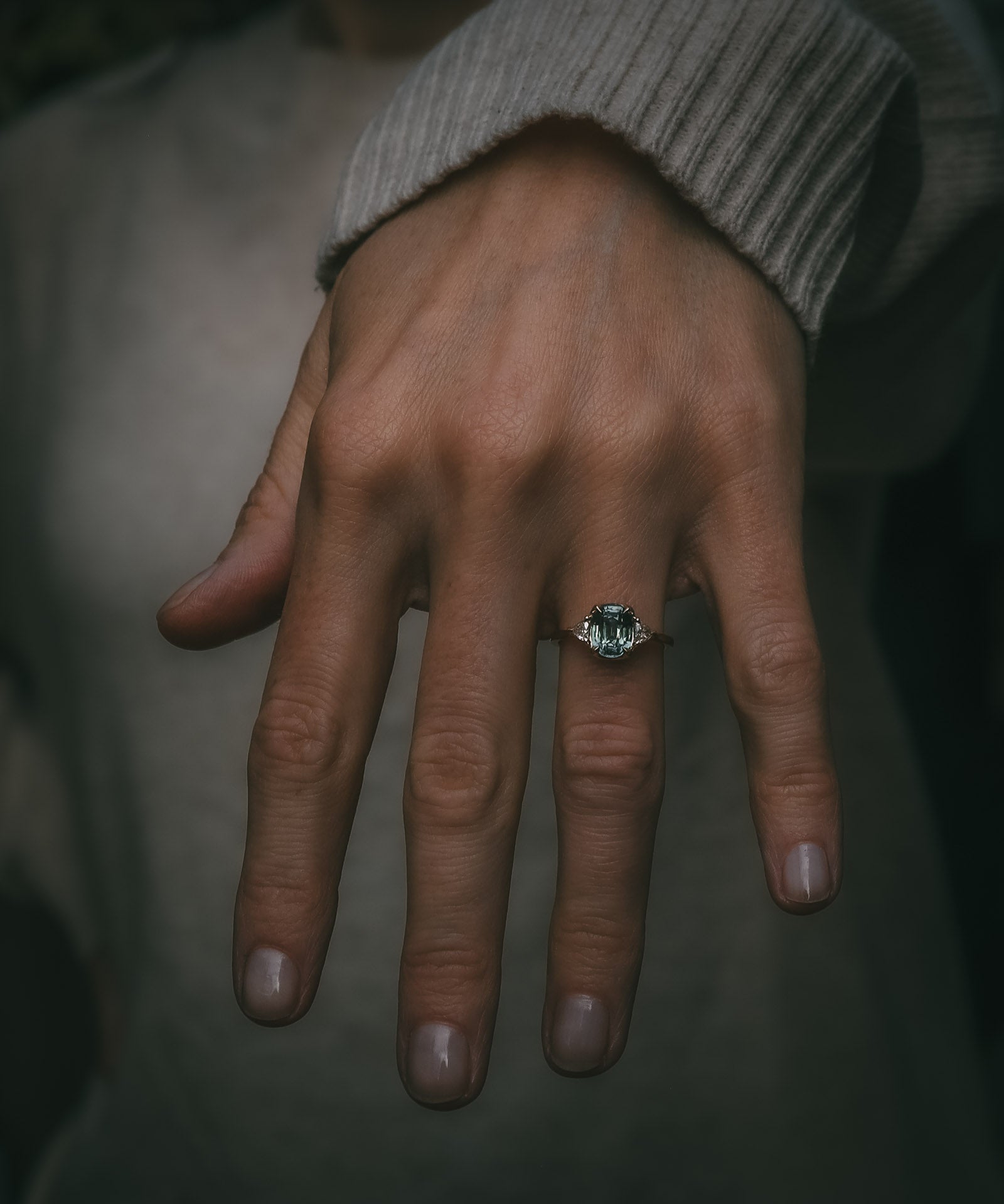 Moira Patience Fine Jewellery teal sapphire engagement ring on hand