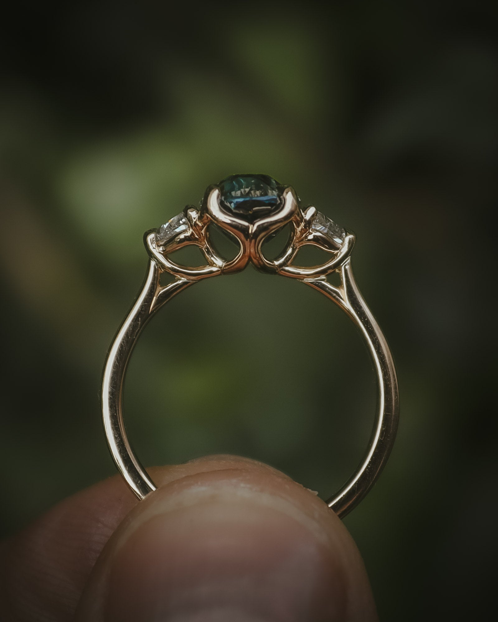 Natural unheated teal sapphire engagement ring profile petal setting detail