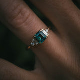 Fine jewellery ring featuring a teal sapphire and diamond accents, crafted in Scotland by Moira Patience