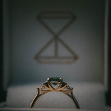 Fine jewellery ring featuring a teal sapphire and diamond accents, crafted in Scotland by Moira Patience