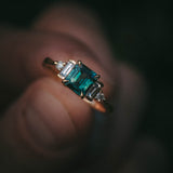 Fine jewellery ring featuring a teal sapphire and diamond accents, crafted in Scotland by Moira Patience