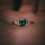 Fine jewellery ring featuring a teal sapphire and diamond accents, crafted in Scotland by Moira Patience