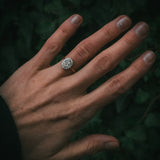 Flùr oval diamond cluster ring on hand; 1.00ct GIA certificated centre diamond