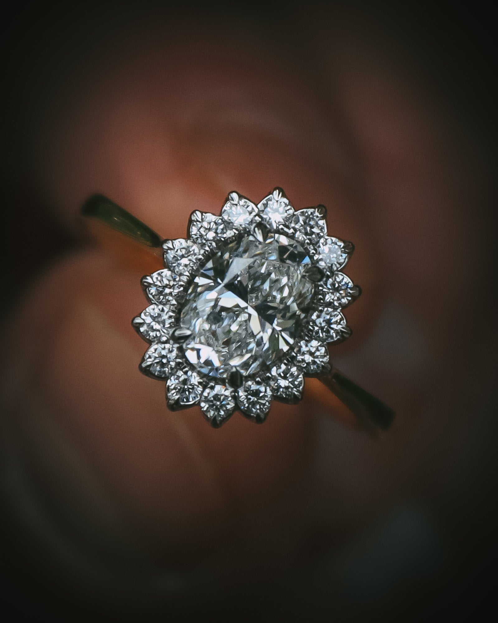 Flùr oval diamond cluster ring front view 1.00ct GIA certificated centre diamond