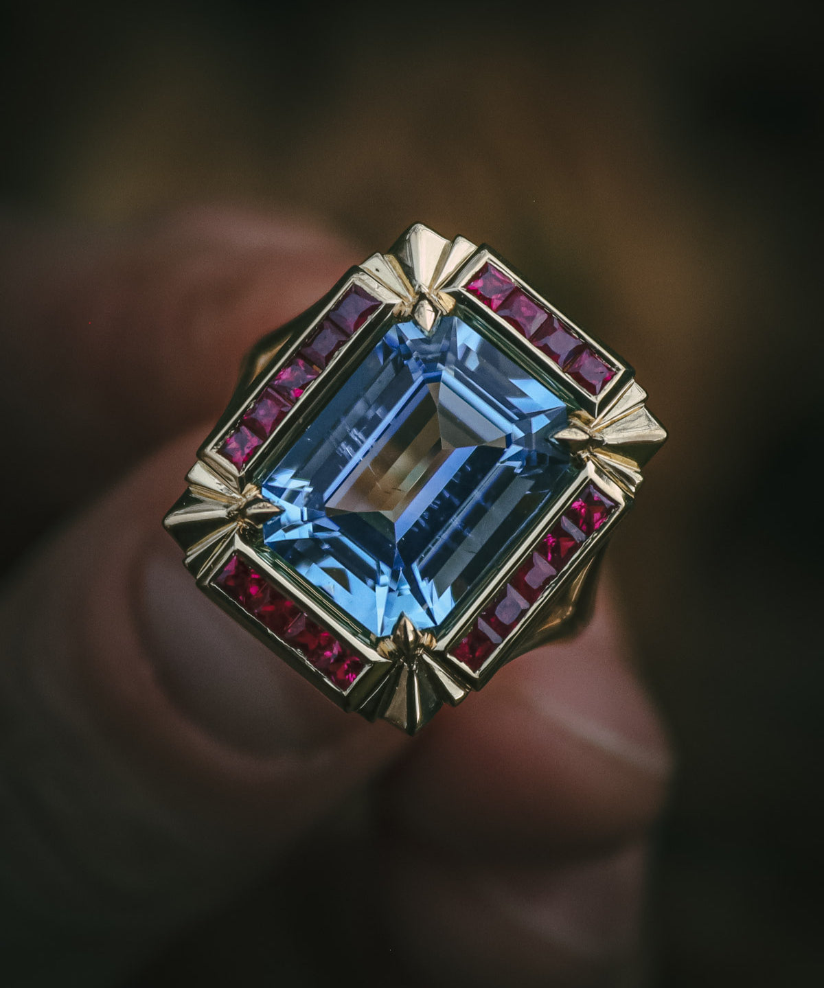 bold art deco style aquamarine and ruby bespoke ring