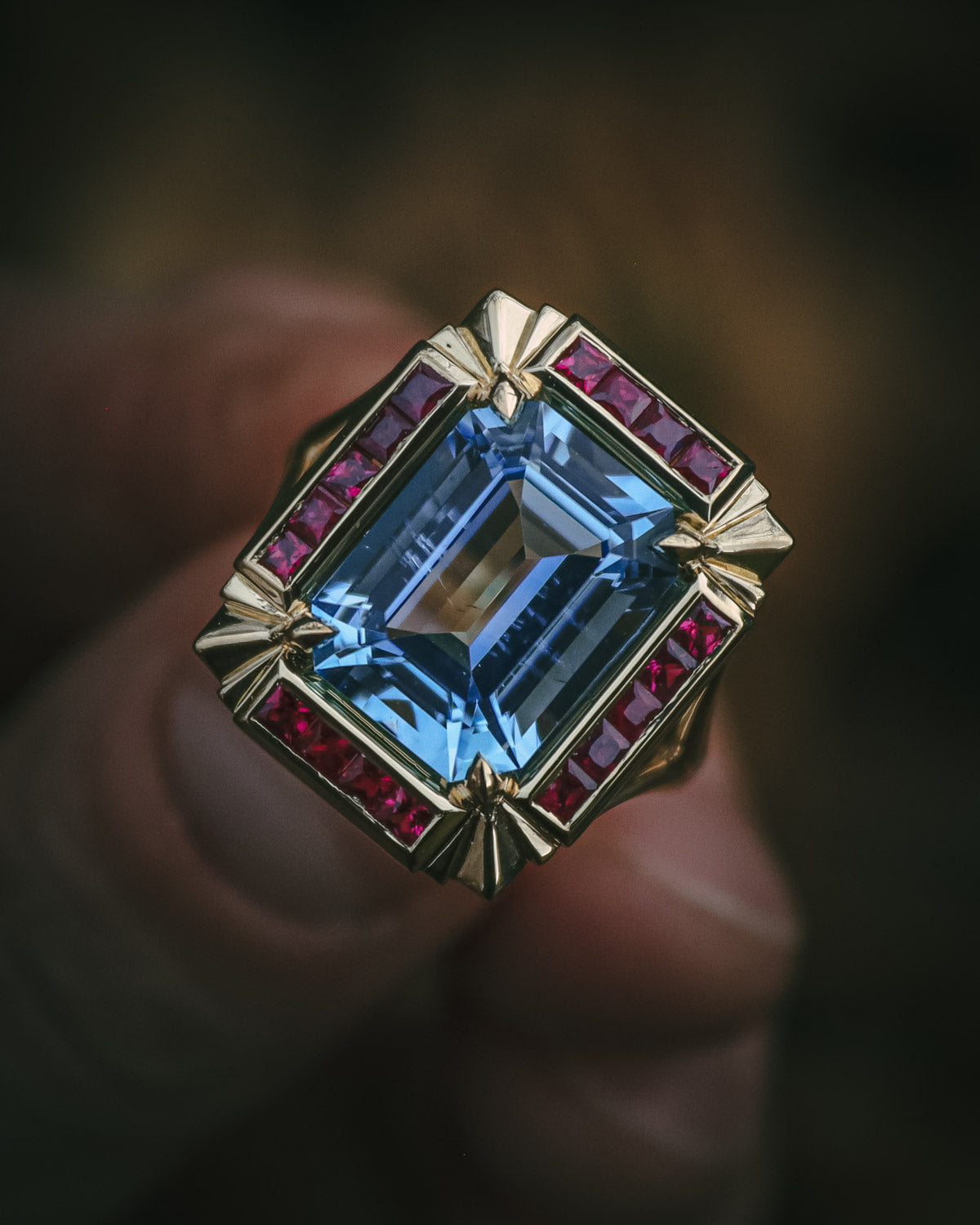bold art deco style aquamarine and ruby bespoke ring