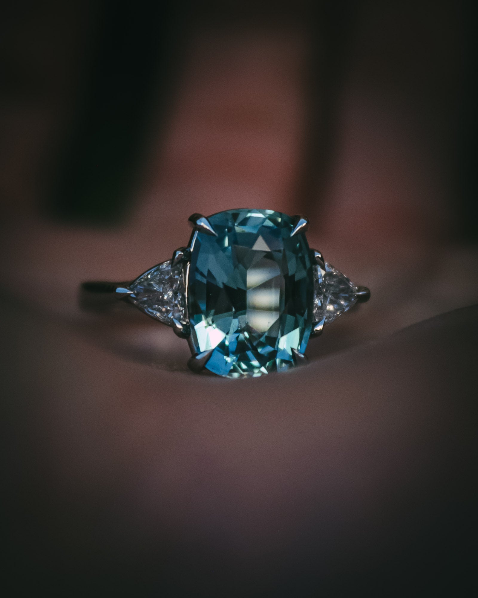Aquamarine engagement ring gemstone details on hand