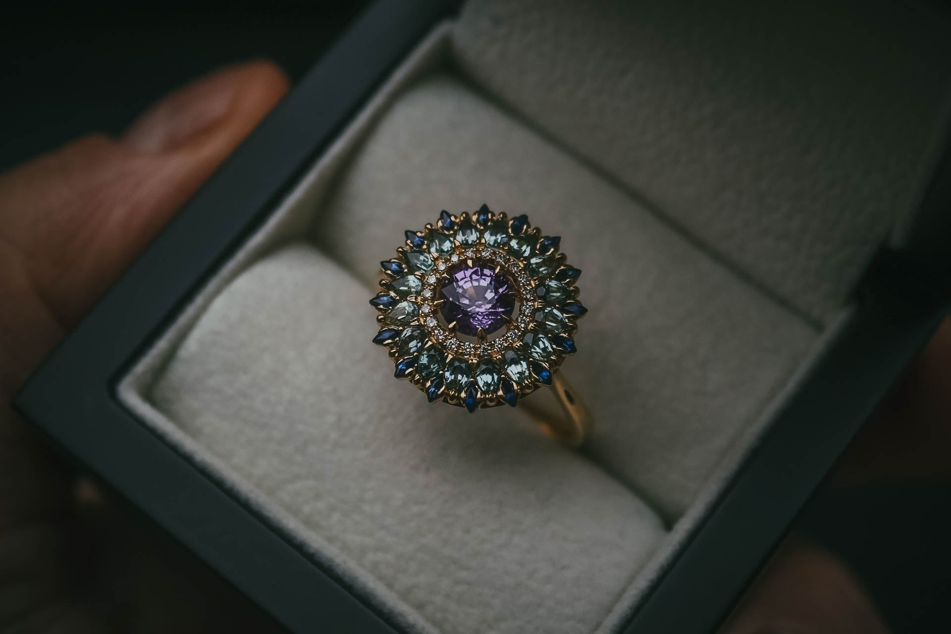 Bespoke sapphire and diamonds aurora inspired ring in box