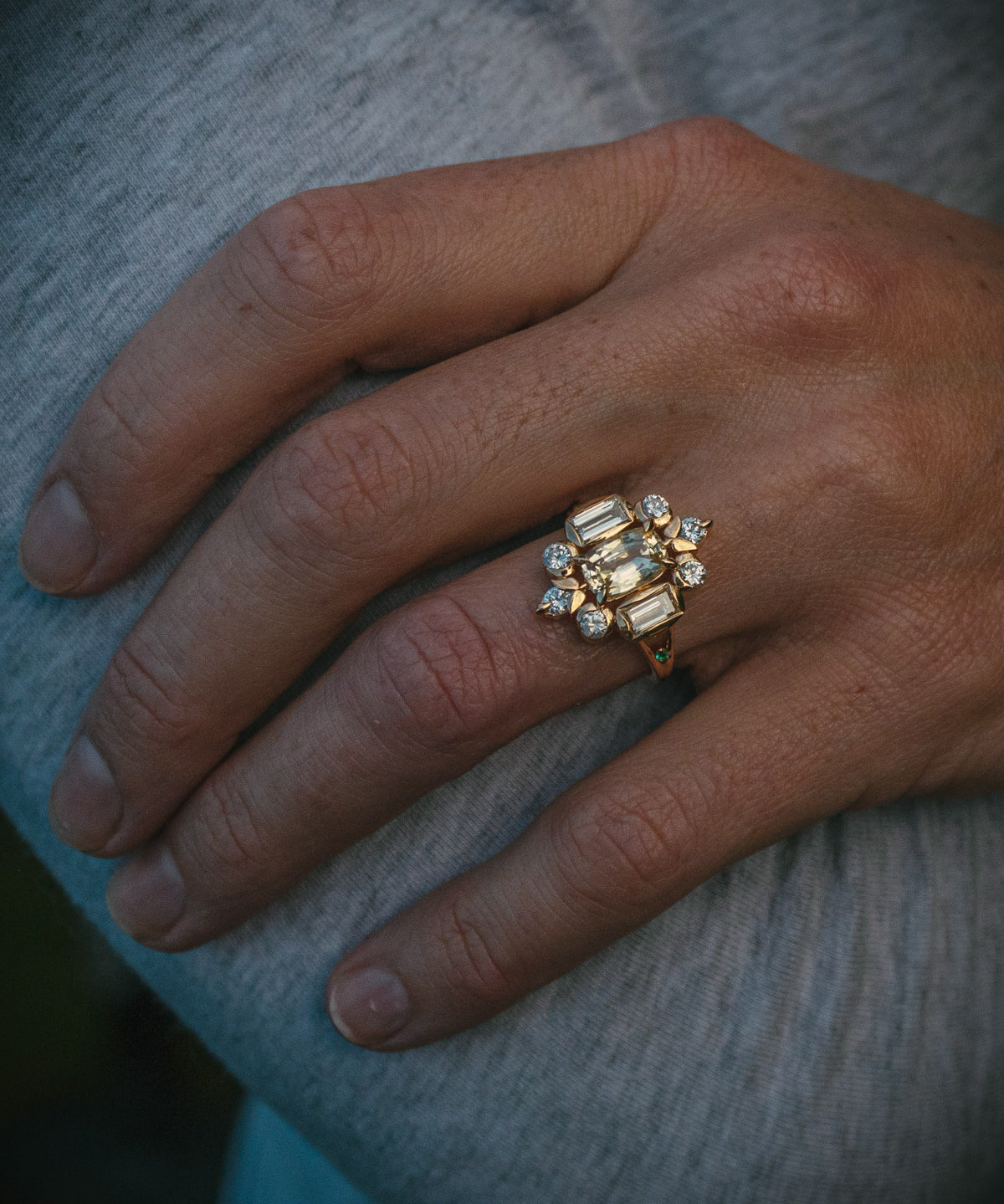 Ornate design bespoke yellow sapphire and warm white diamond ring