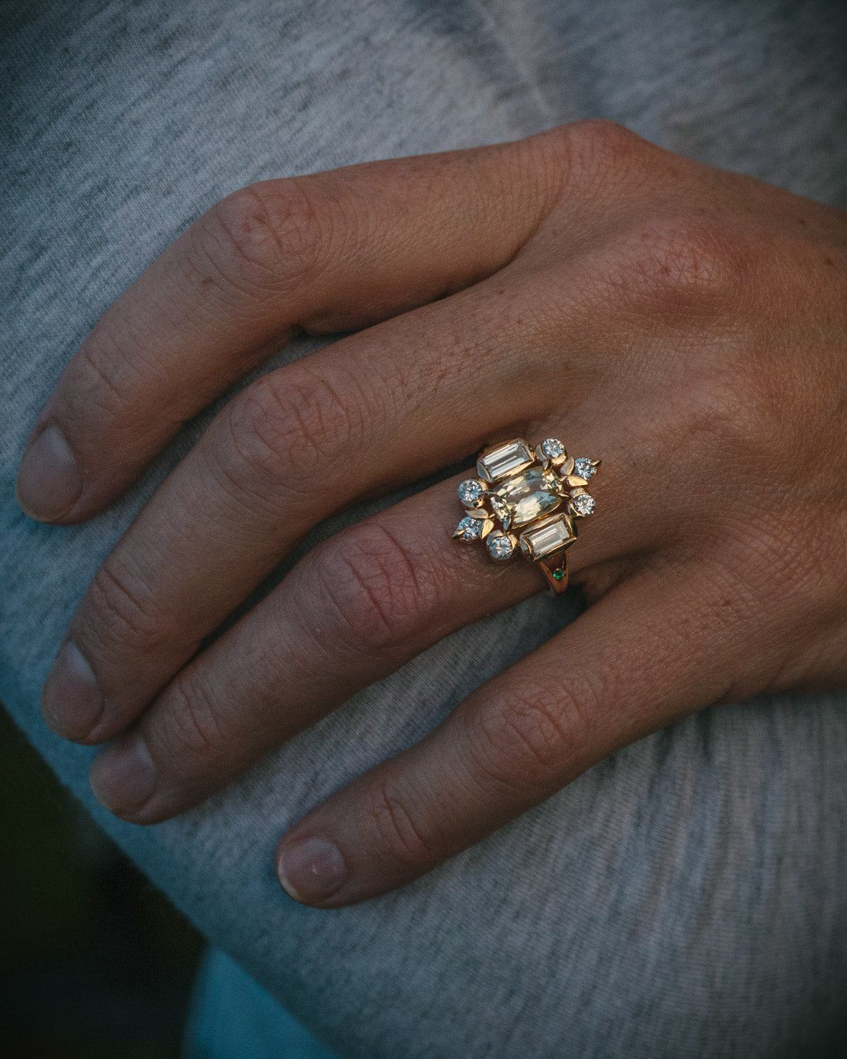 Ornate design bespoke yellow sapphire and warm white diamond ring