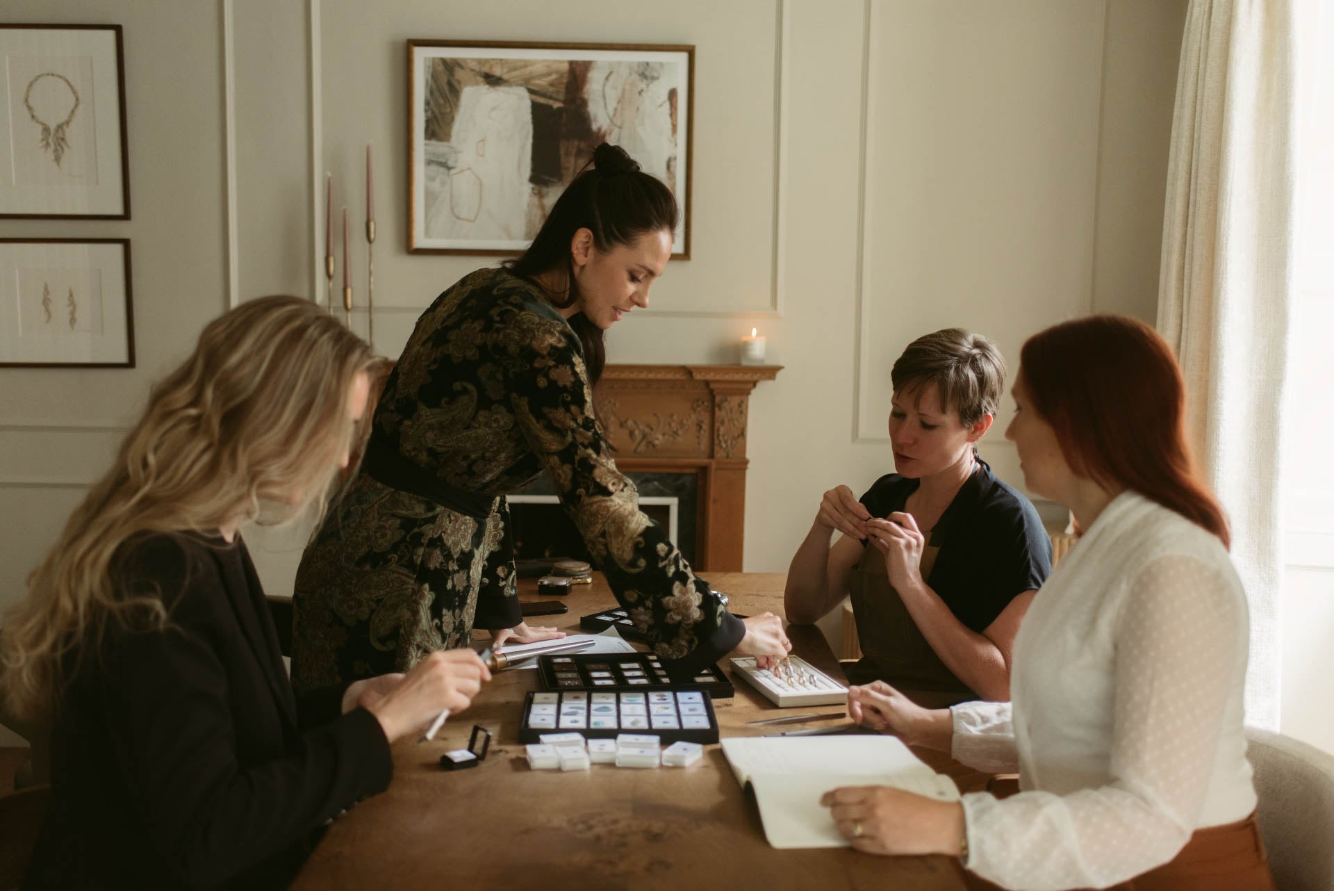 Moira Patience and the team with gemstones in the showroom